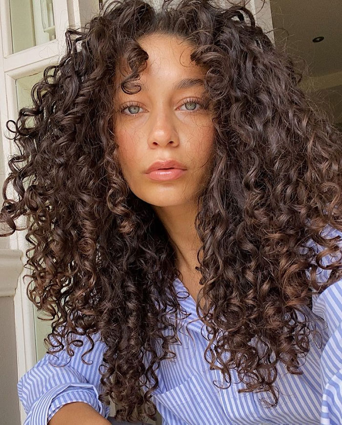 Get the Perfect Curly layers with Bangs Look: Transform Your Hair Today!