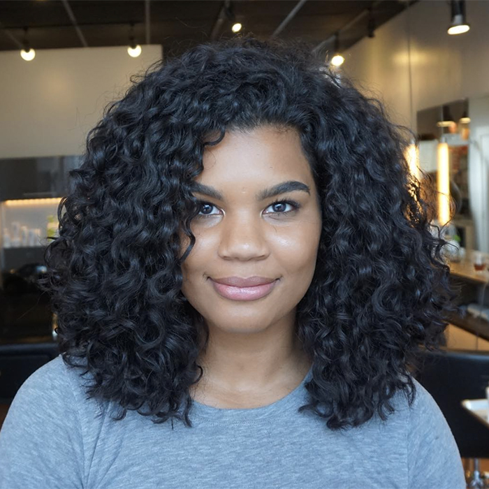 The Top Haircuts for Curly Hair and Round Faces & How to Ask for